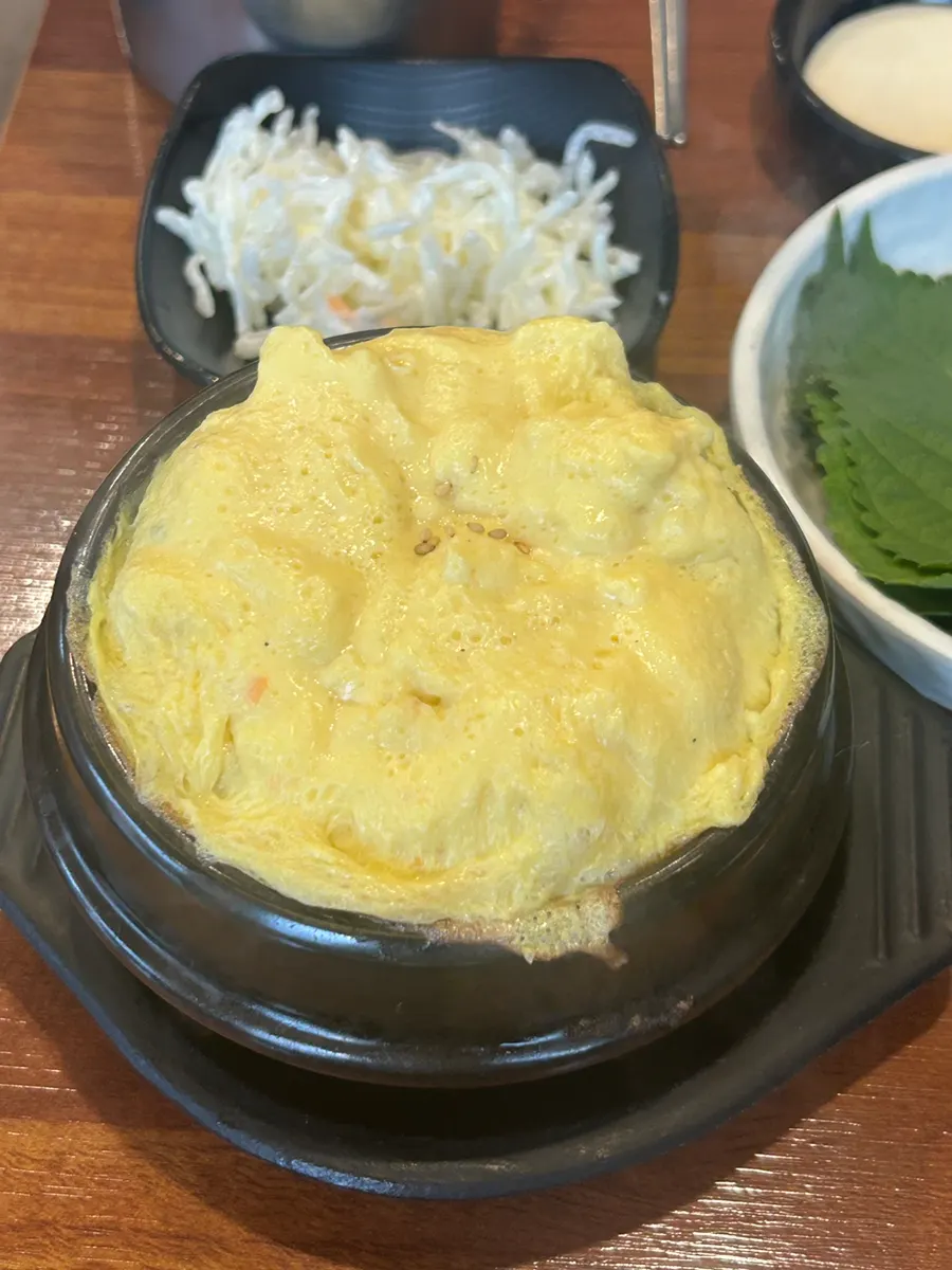 Steamed egg served with a jjukkumi meal