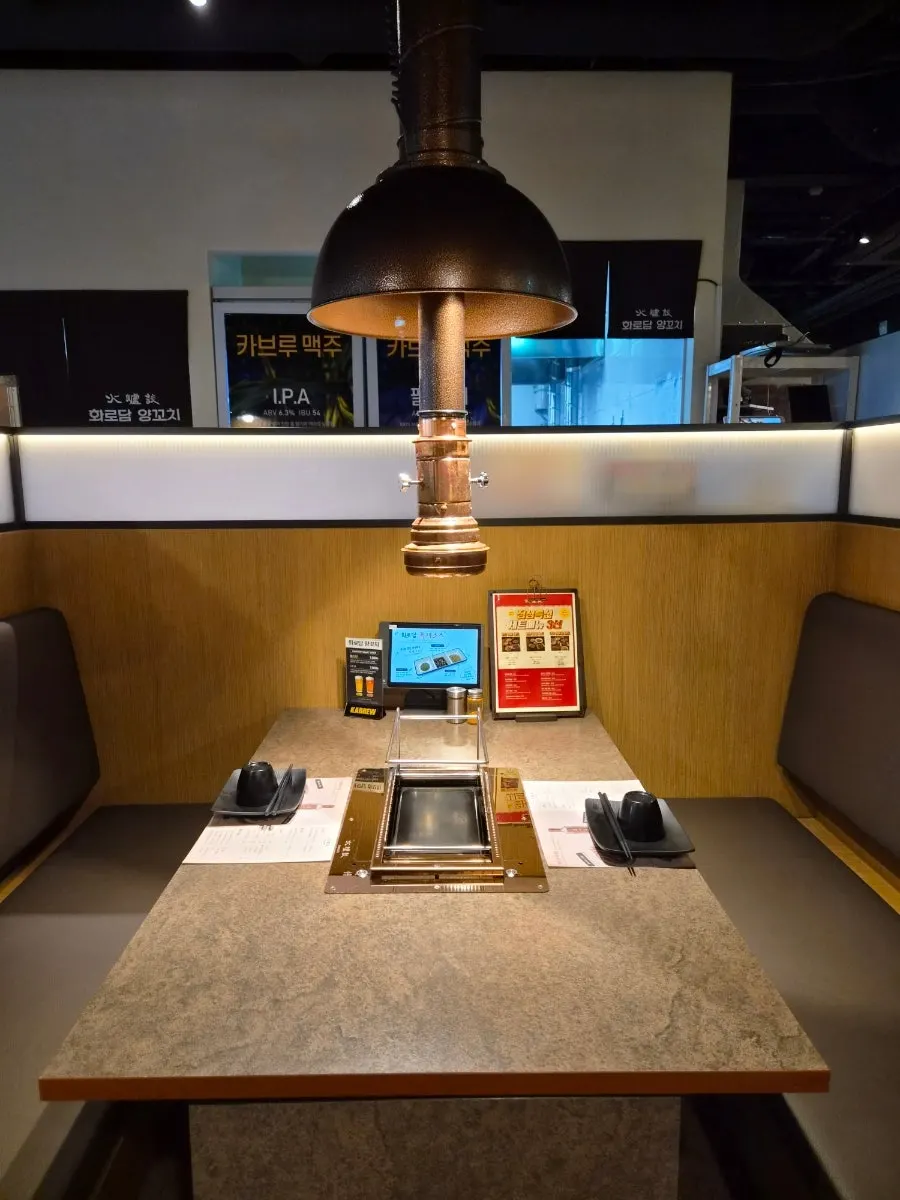 Charcoal brazier at the restaurant entrance
