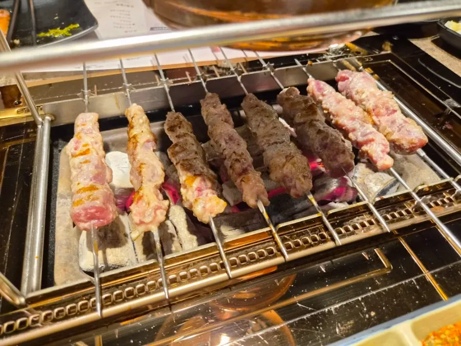 A plate of charcoal-grilled lamb ribs