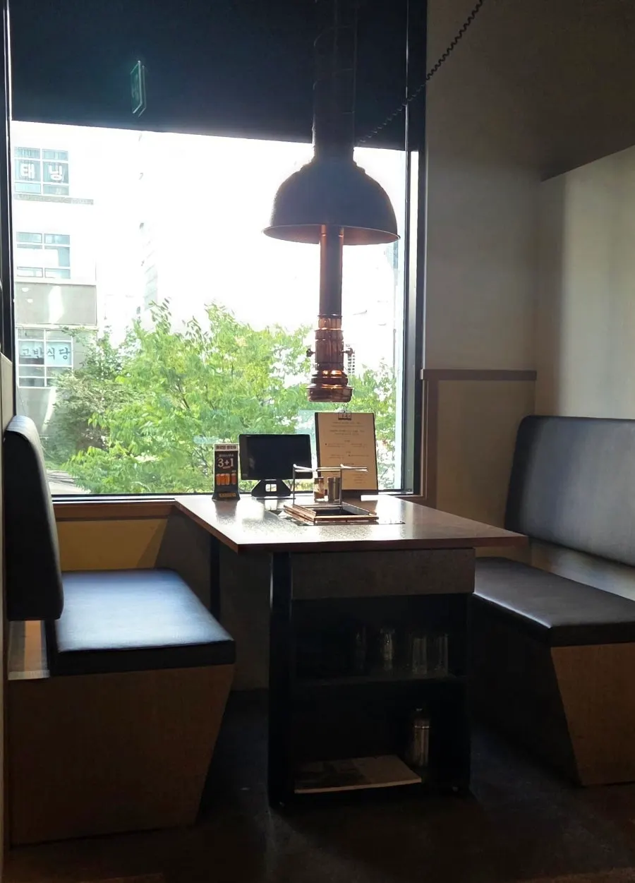 Private seating with frosted glass on top
