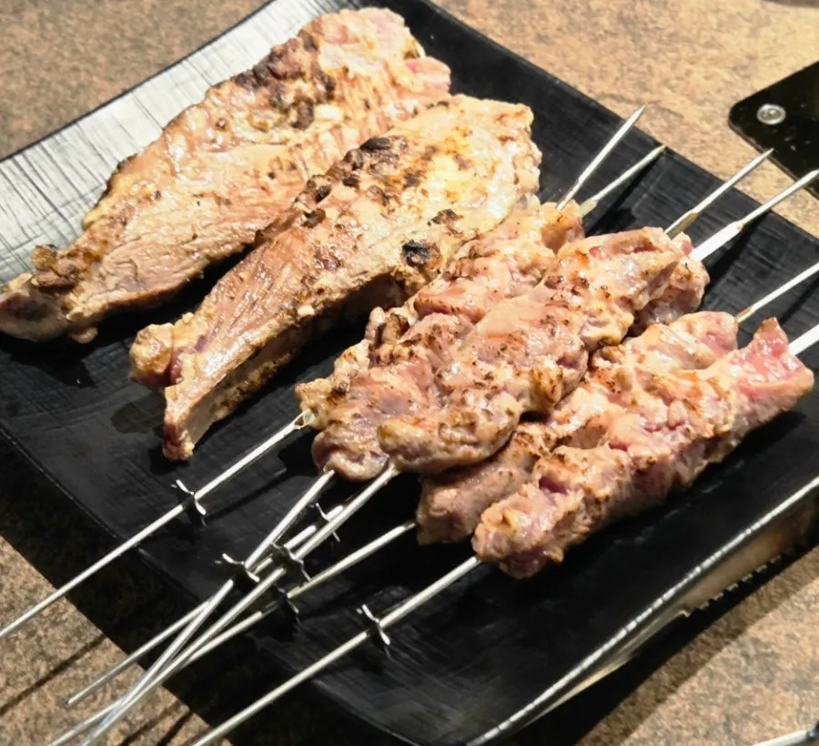 Pre-seared lamb shoulder rack and sirloin skewers