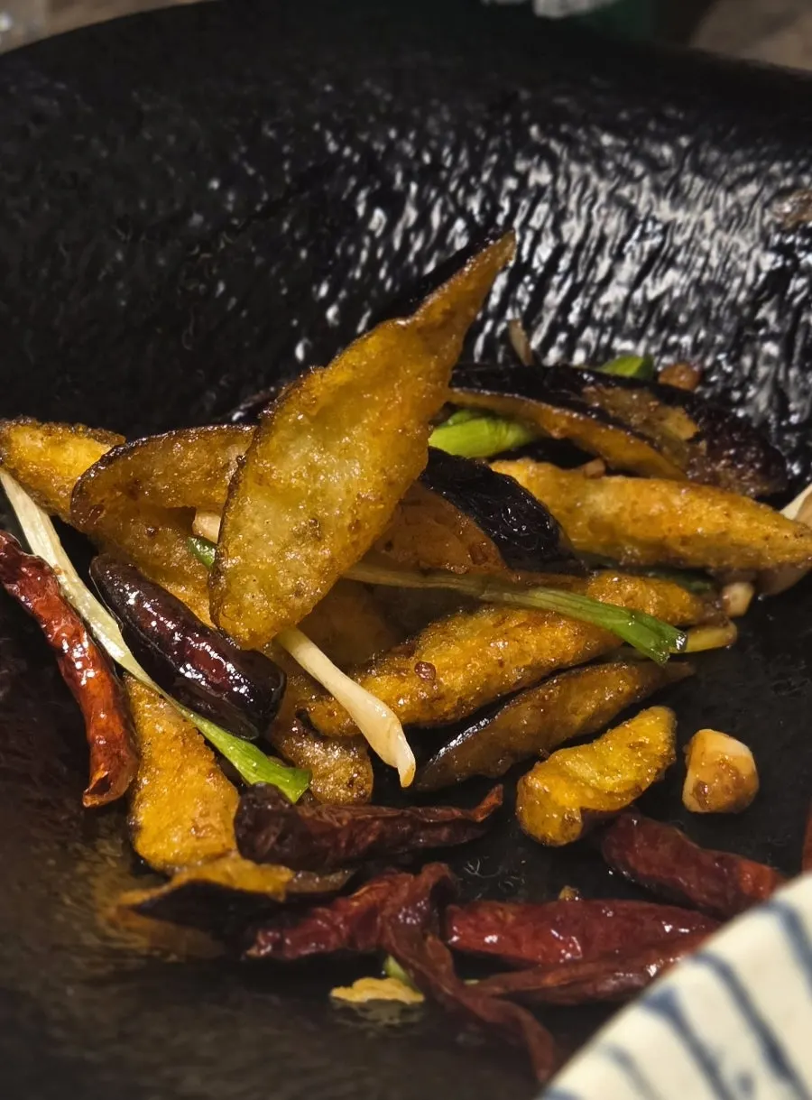 A piece of guo bao rou with thin batter
