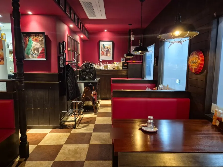 A 4-person table and interior atmosphere at Taqueros