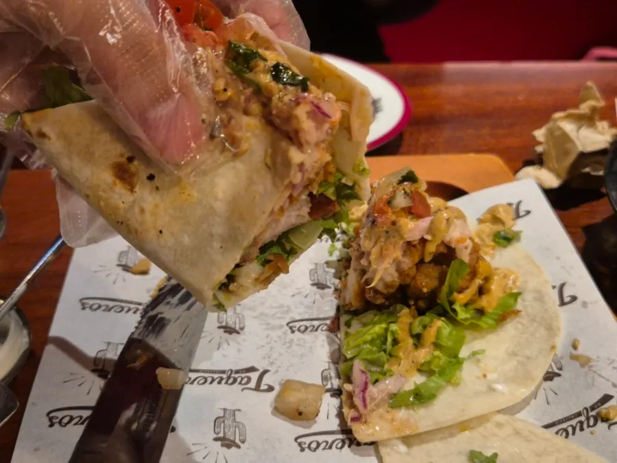 A chicken taco cut into bite-sized pieces