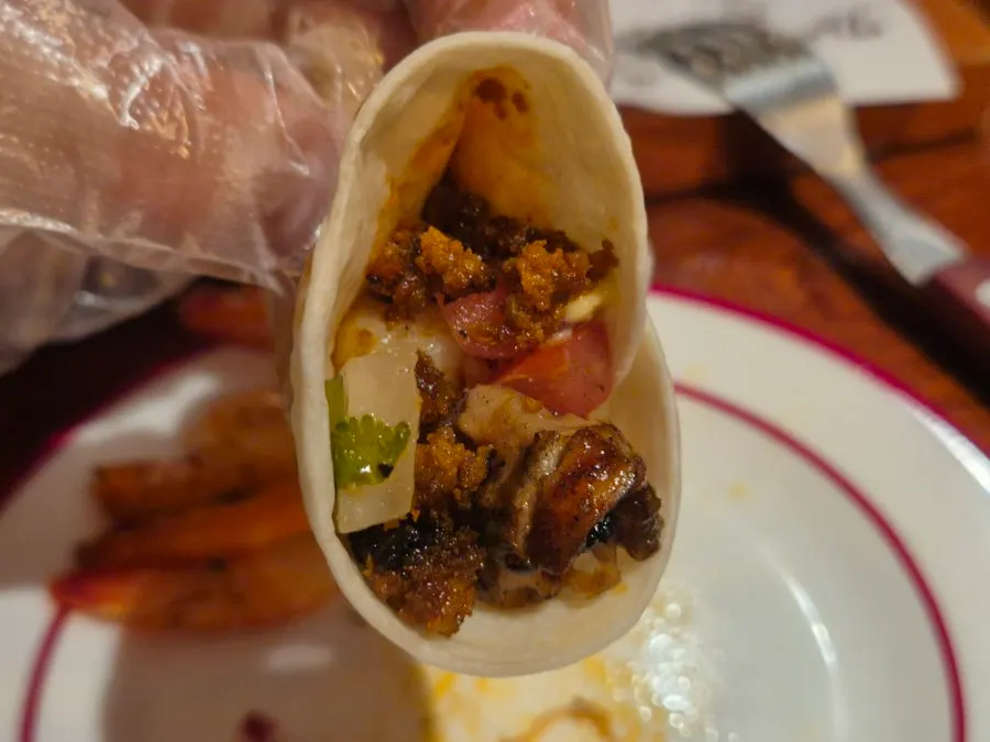 Wrapping meat and vegetables in a tortilla