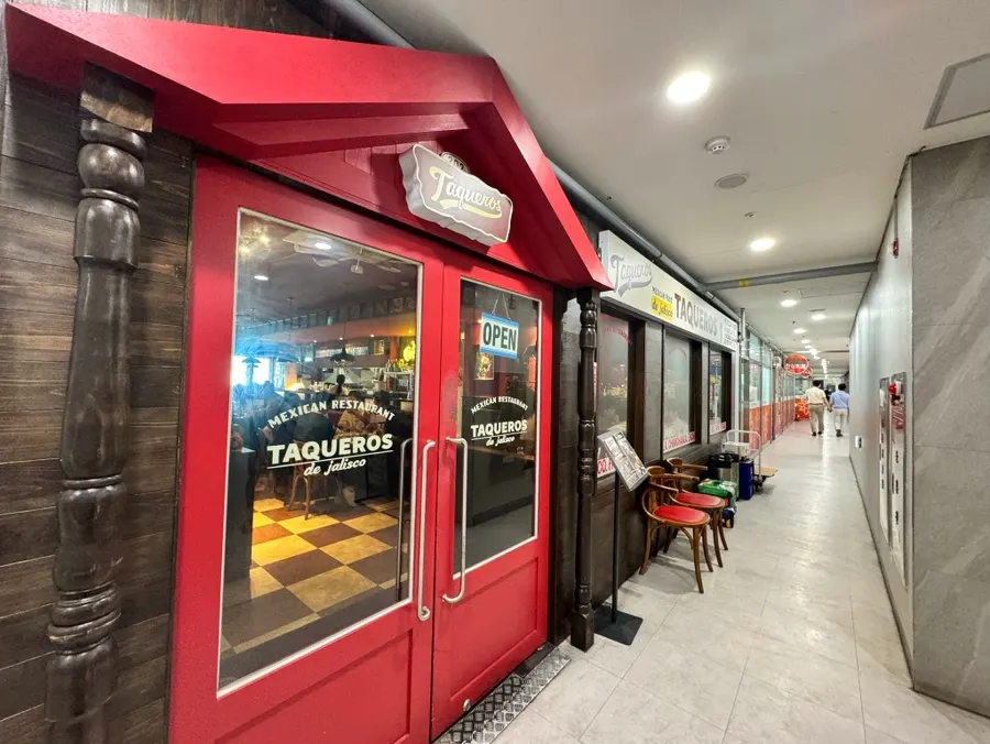 Photo of Taqueros' exterior and interior atmosphere