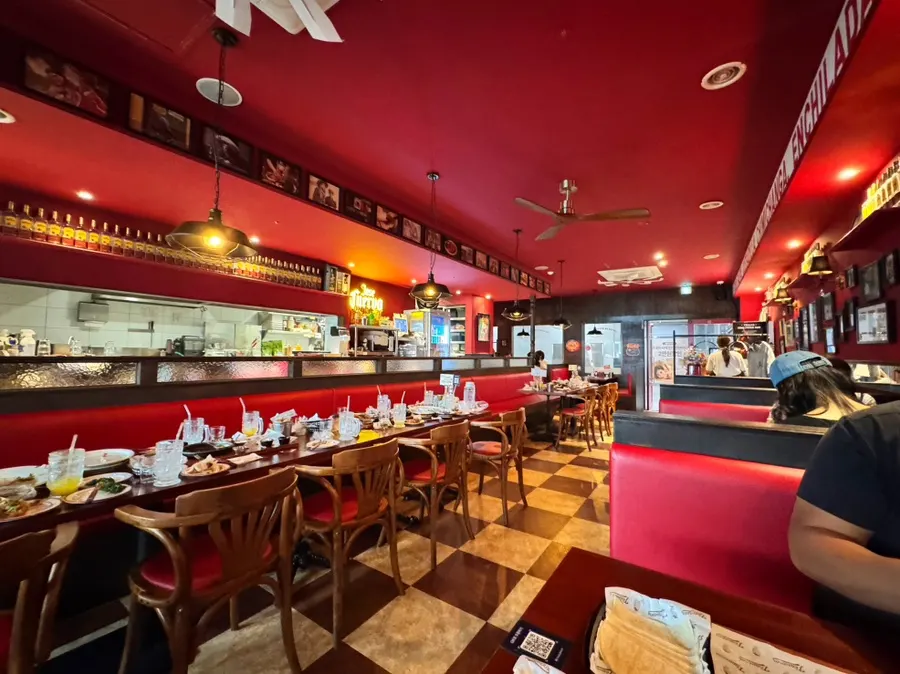 Photo of Taqueros' exterior and interior atmosphere