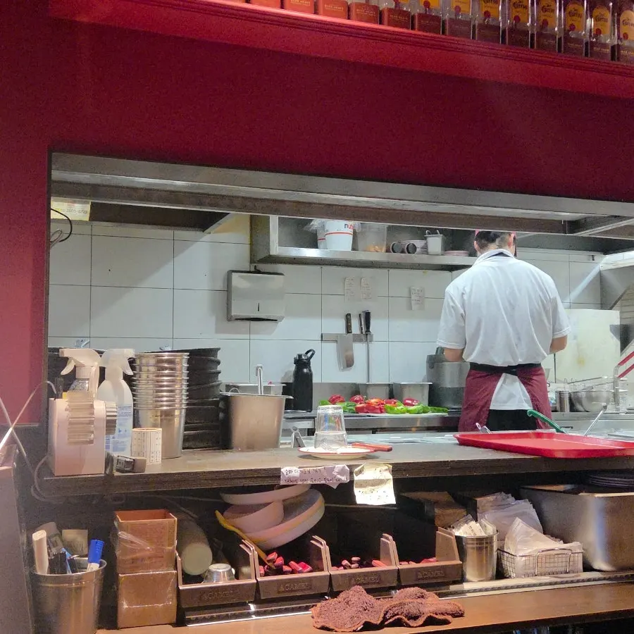 Taqueros open kitchen cooking area