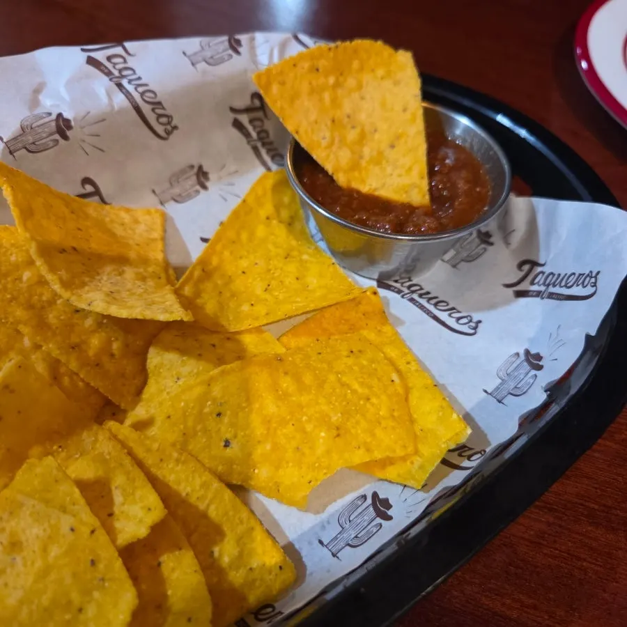 Complimentary nachos served at Taqueros