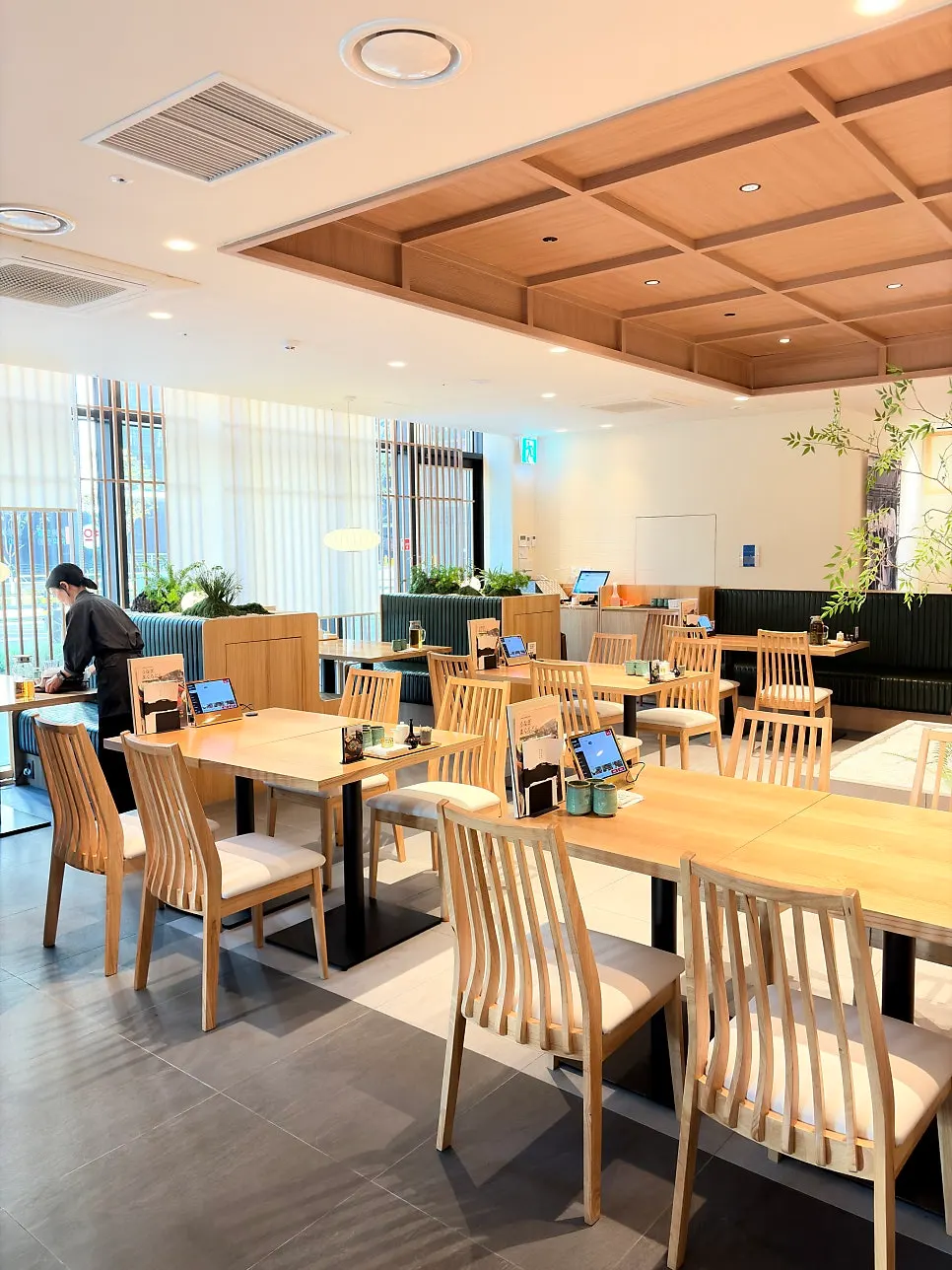 Interior of the Japanese restaurant decorated with wood and lighting