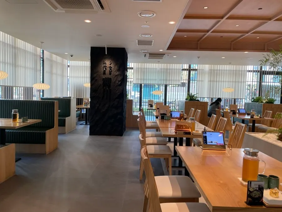 Signage explaining Kikukawa's four-generation eel restaurant history