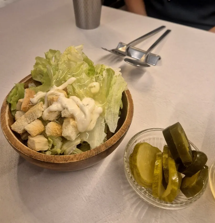 Salad bar served using wooden bowls