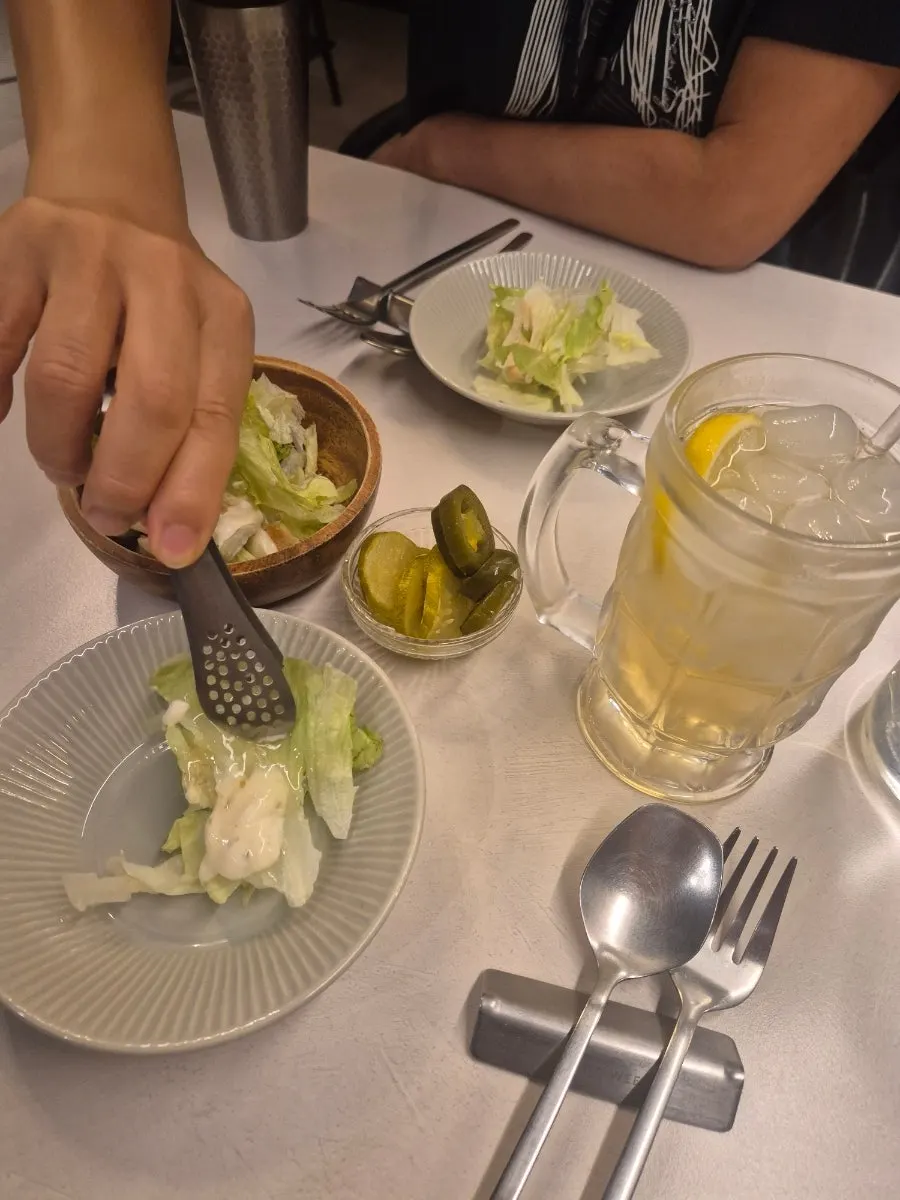 Lemon dressing, pickles, and jalapeños
