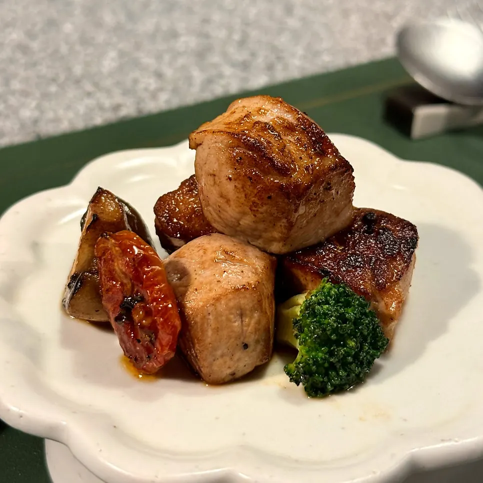 Plate of shio koji tenderloin with button mushroom