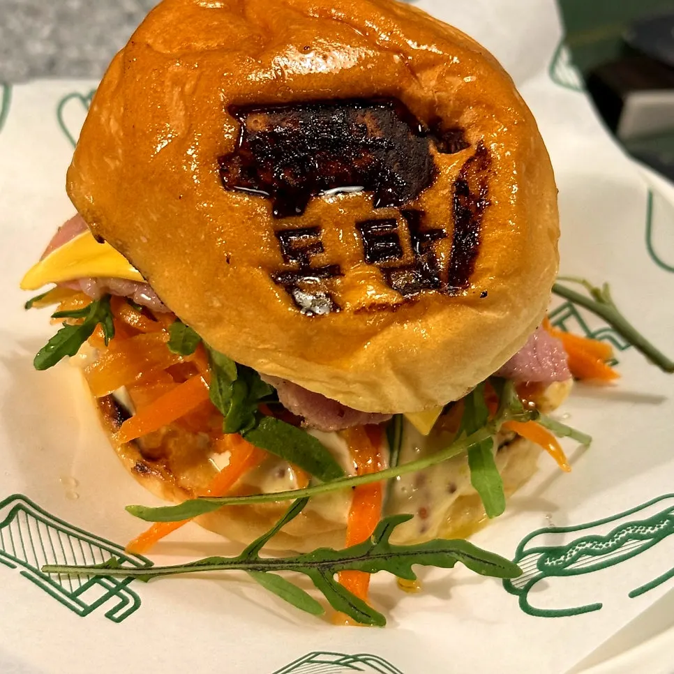 Signature burger with jambon and arugula