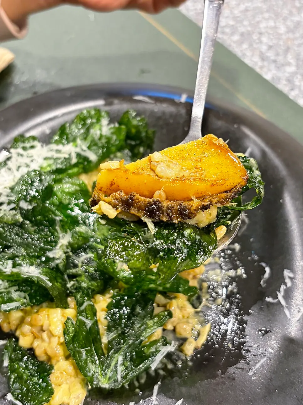Abalone and barley risotto topped with fried glasswort