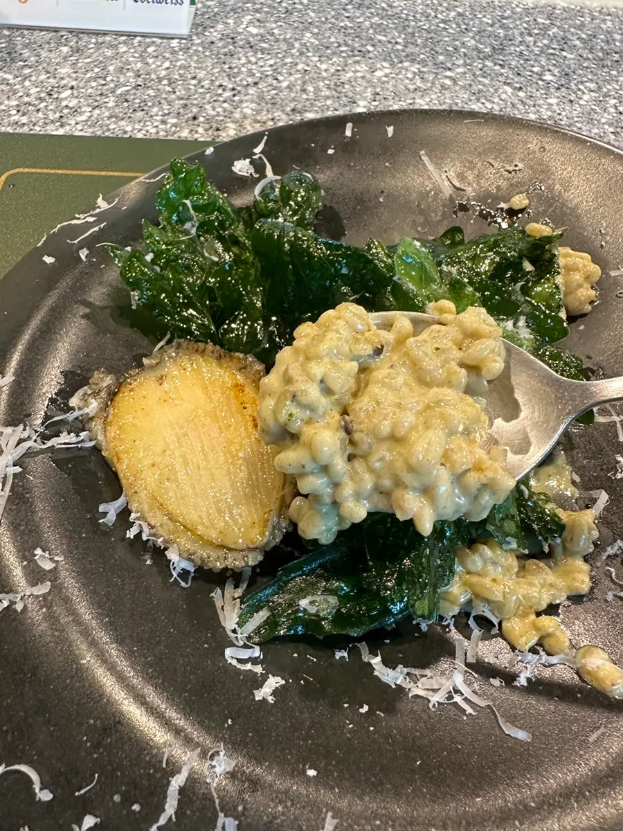 Abalone risotto topped with fried bangpung greens