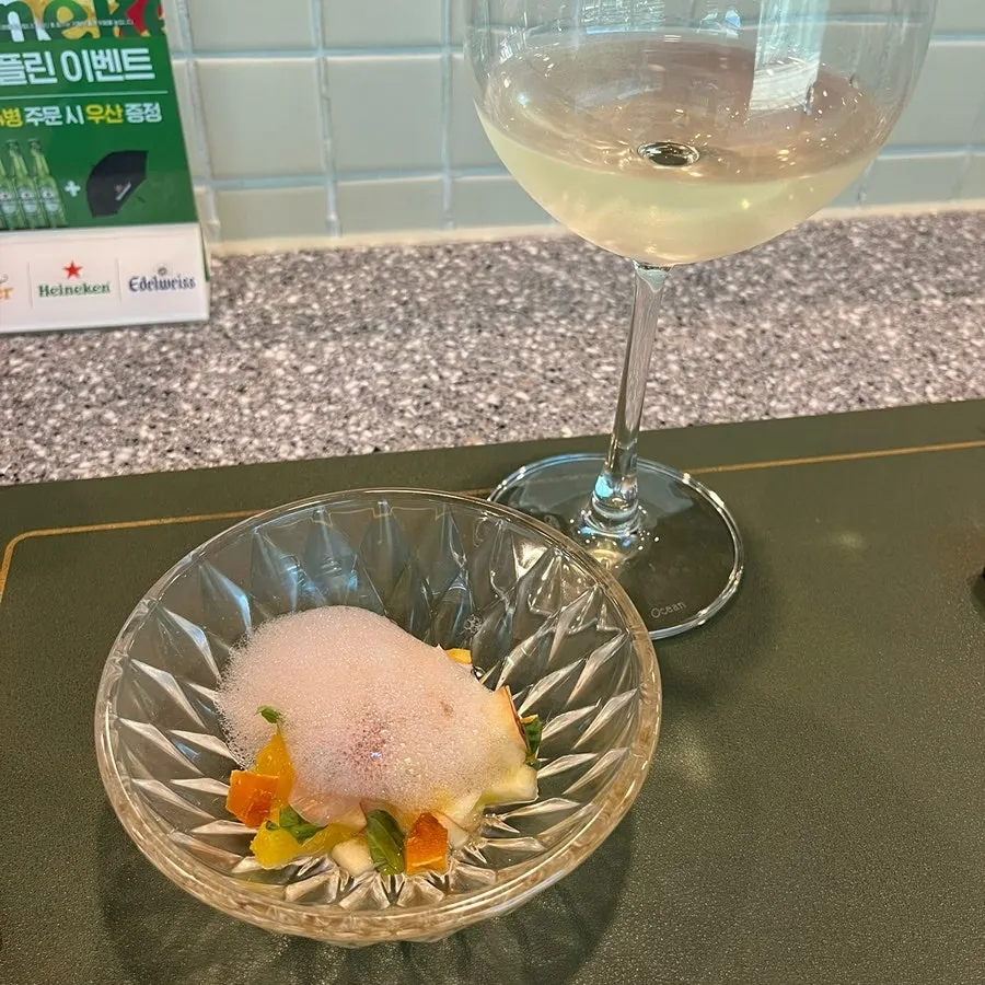 Salad course topped with omija foam