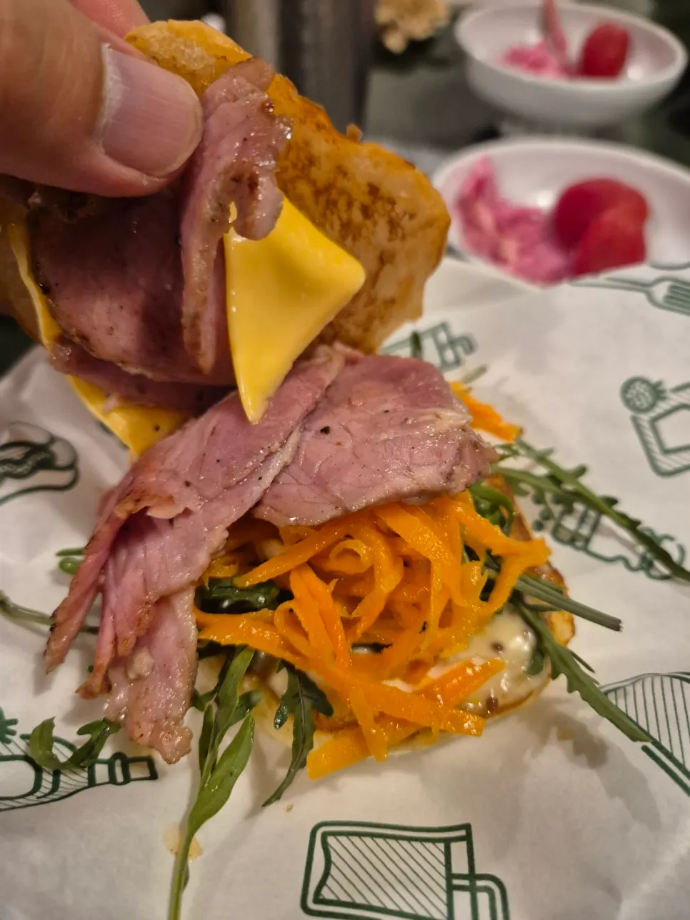 Cross-section of the signature burger with Isigny butter-grilled bun
