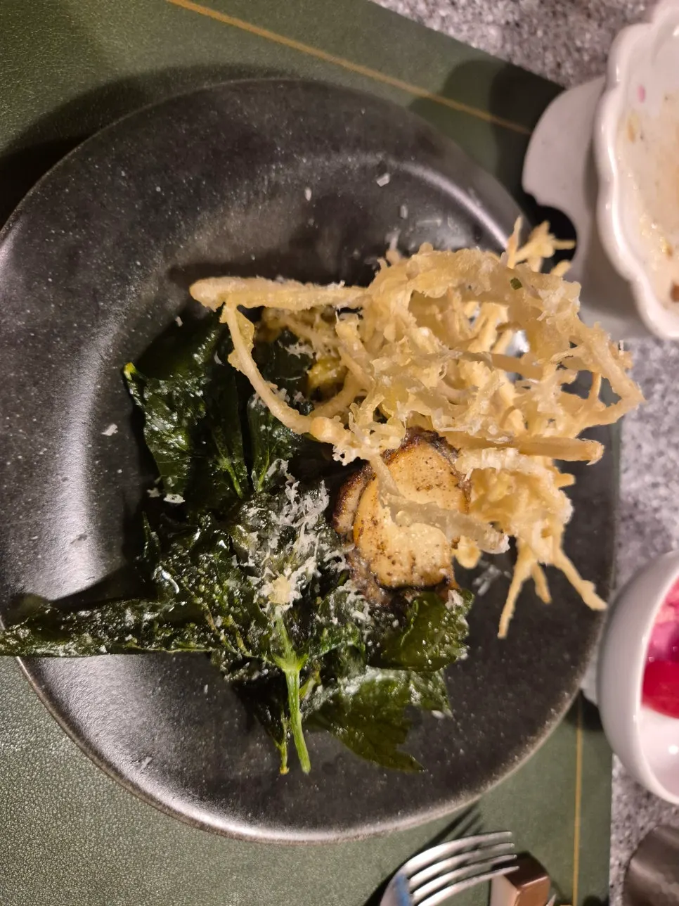 Wando abalone barley risotto topped with fried glasswort