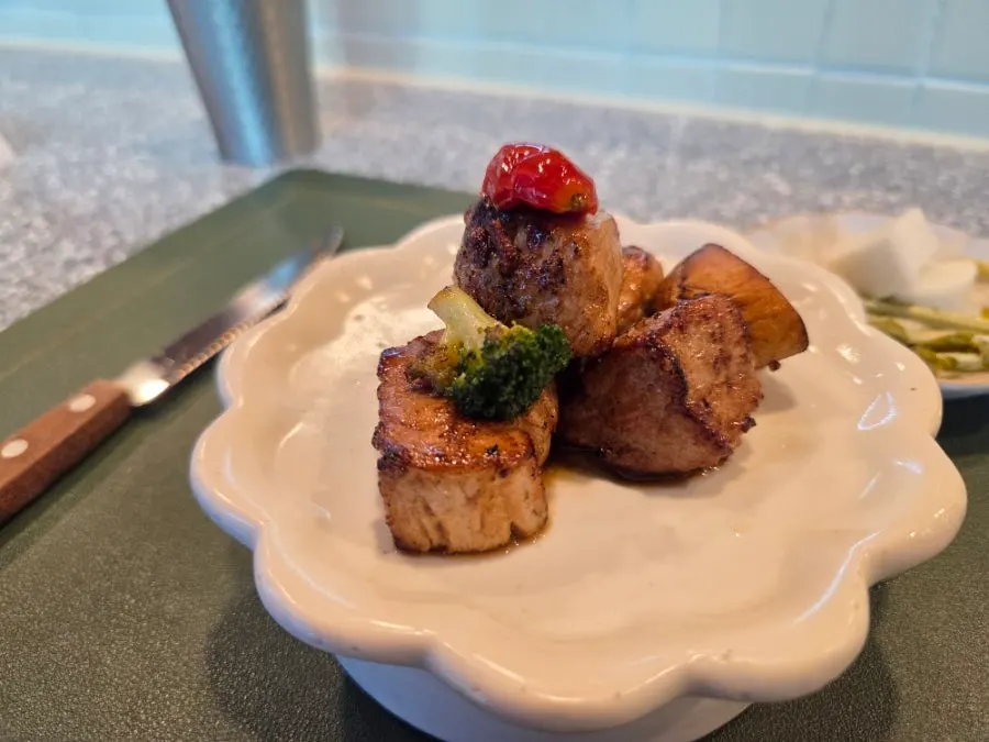 Pork tenderloin topped with sun-dried tomato