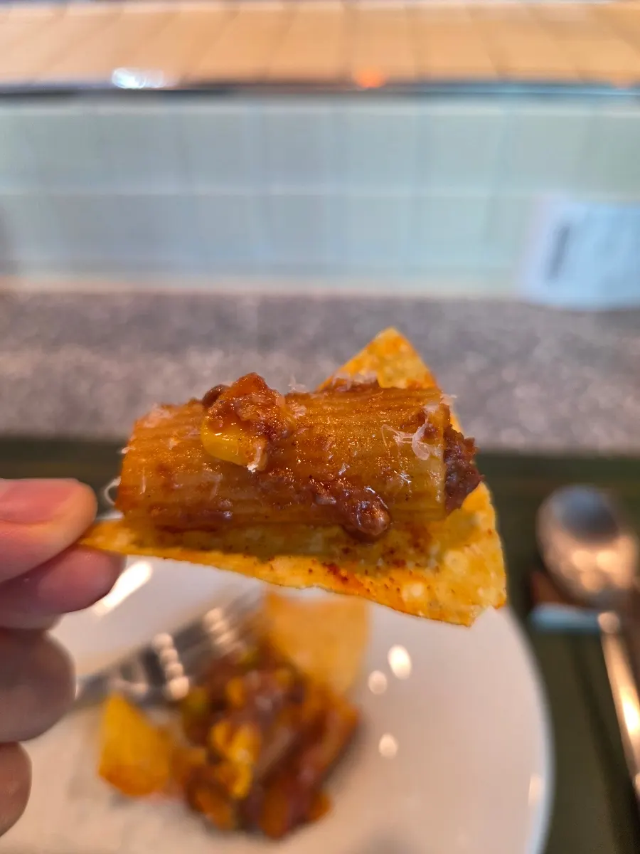 Eating rigatoni piled on top of nachos