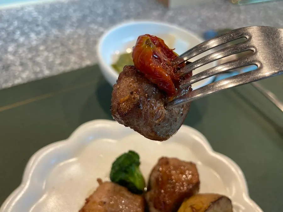 A plate of tenderloin paired with a side