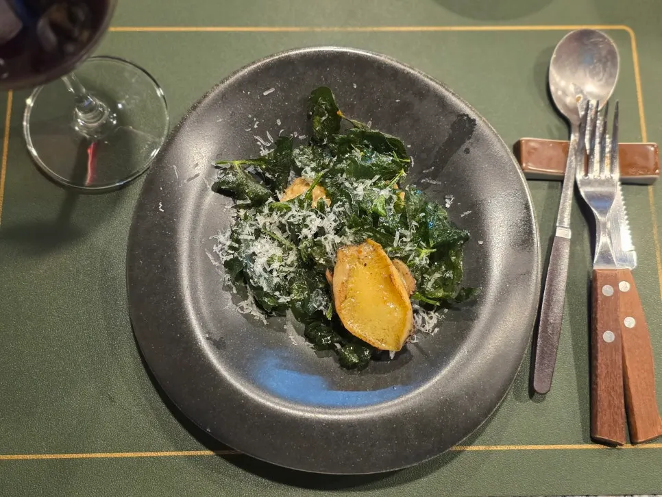 Abalone risotto topped with fried glasswort