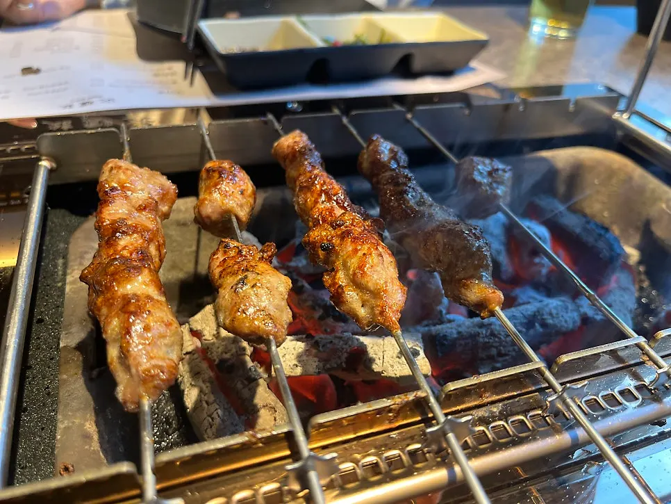 Par-grilled lamb shoulder rack