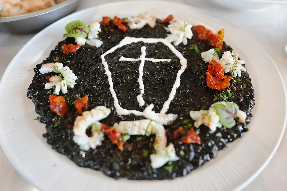Eclipse squid ink risotto