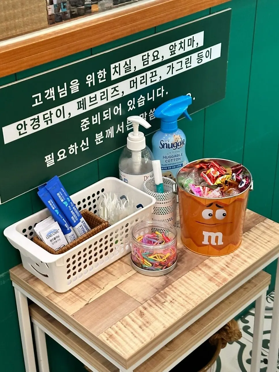 Floss, hair ties, and mouthwash set out at the register
