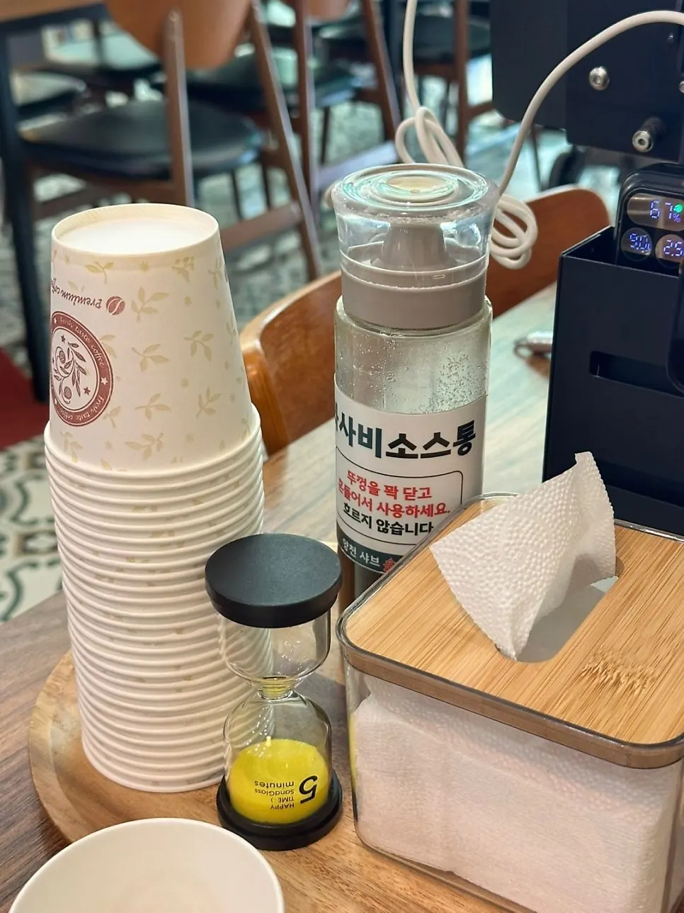 Tablet guide on the table showing how to eat for best flavor