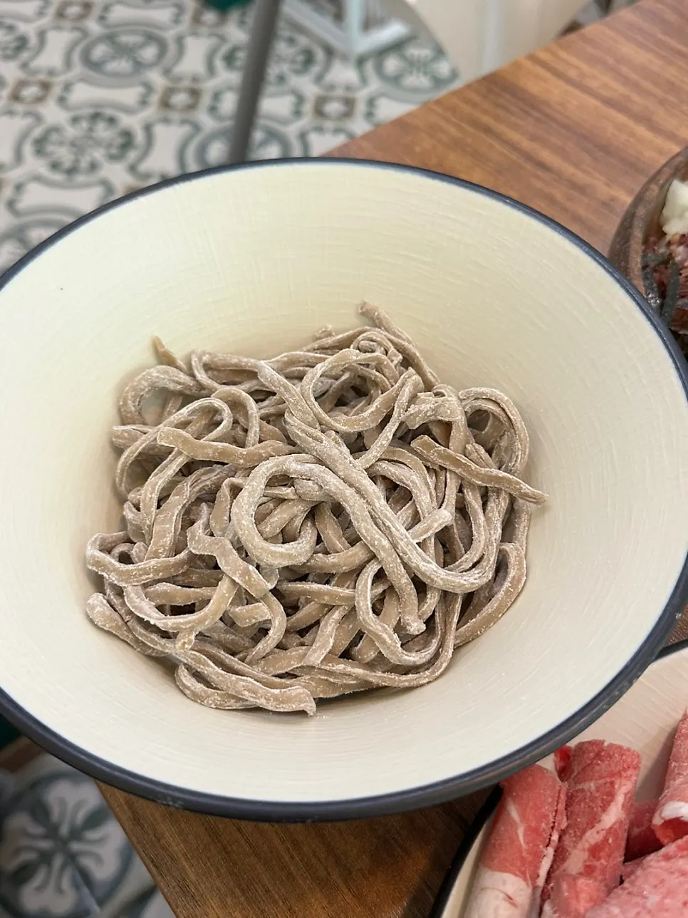 Hourglass timer on the table for timing the noodles