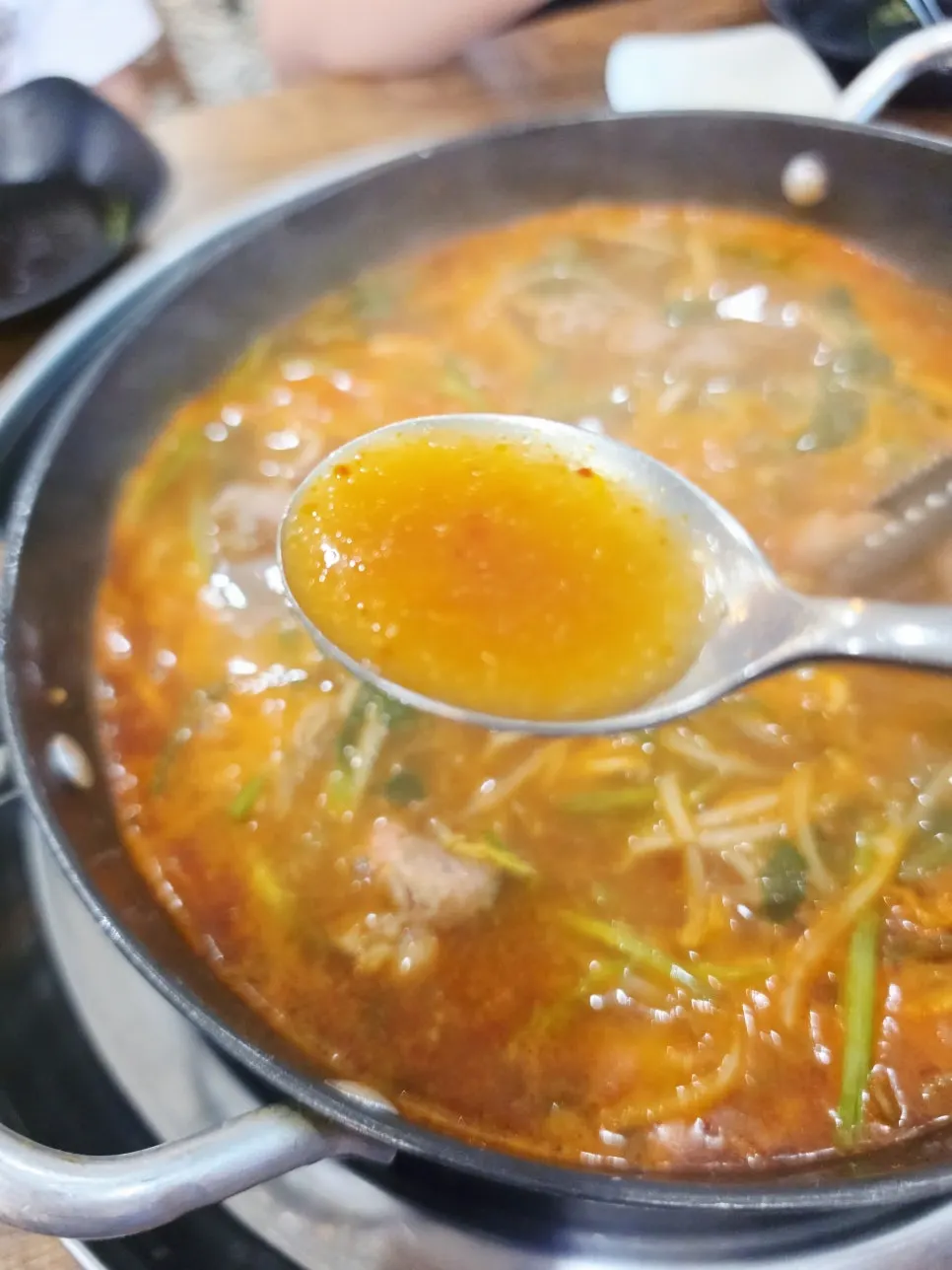 Plate of shabu meat and vegetables fished out of the pot
