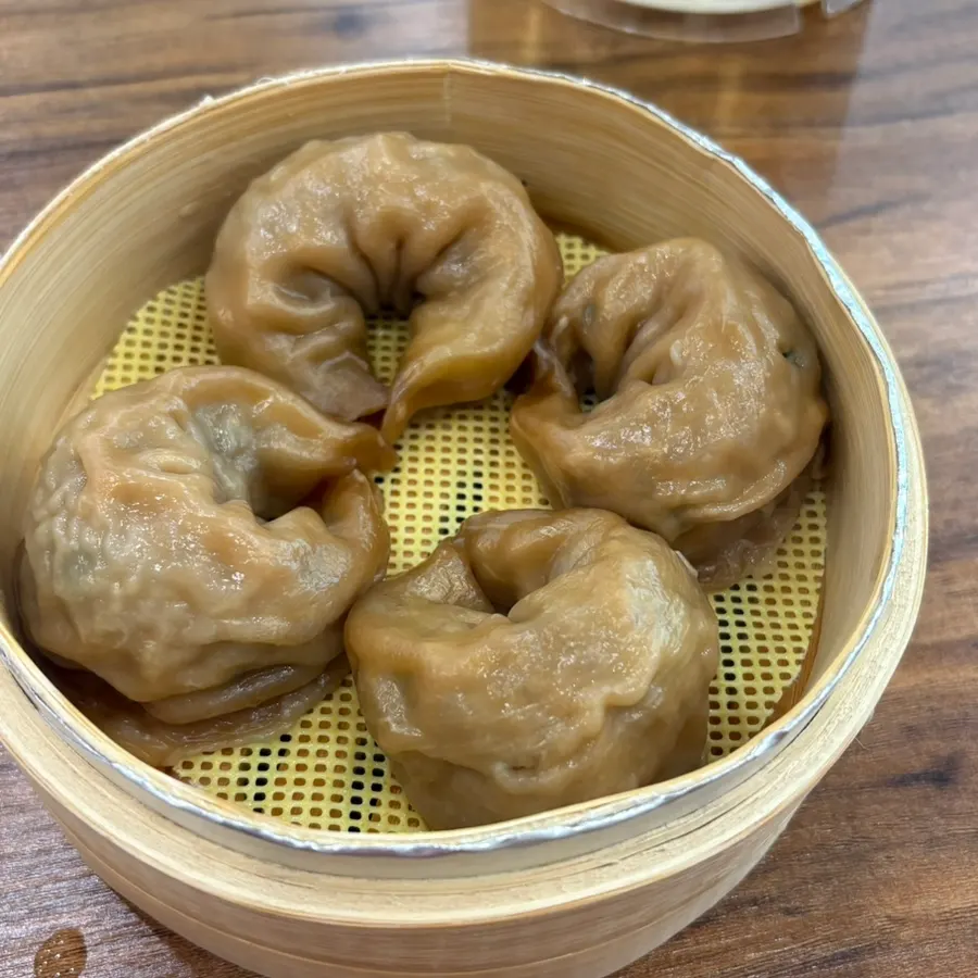 Four handmade black garlic dumplings