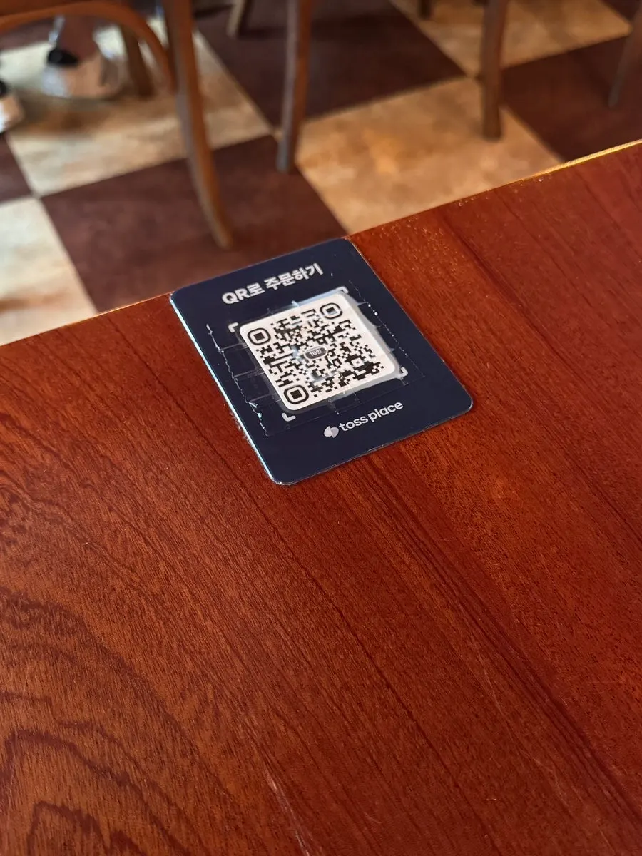 Table with QR ordering instructions