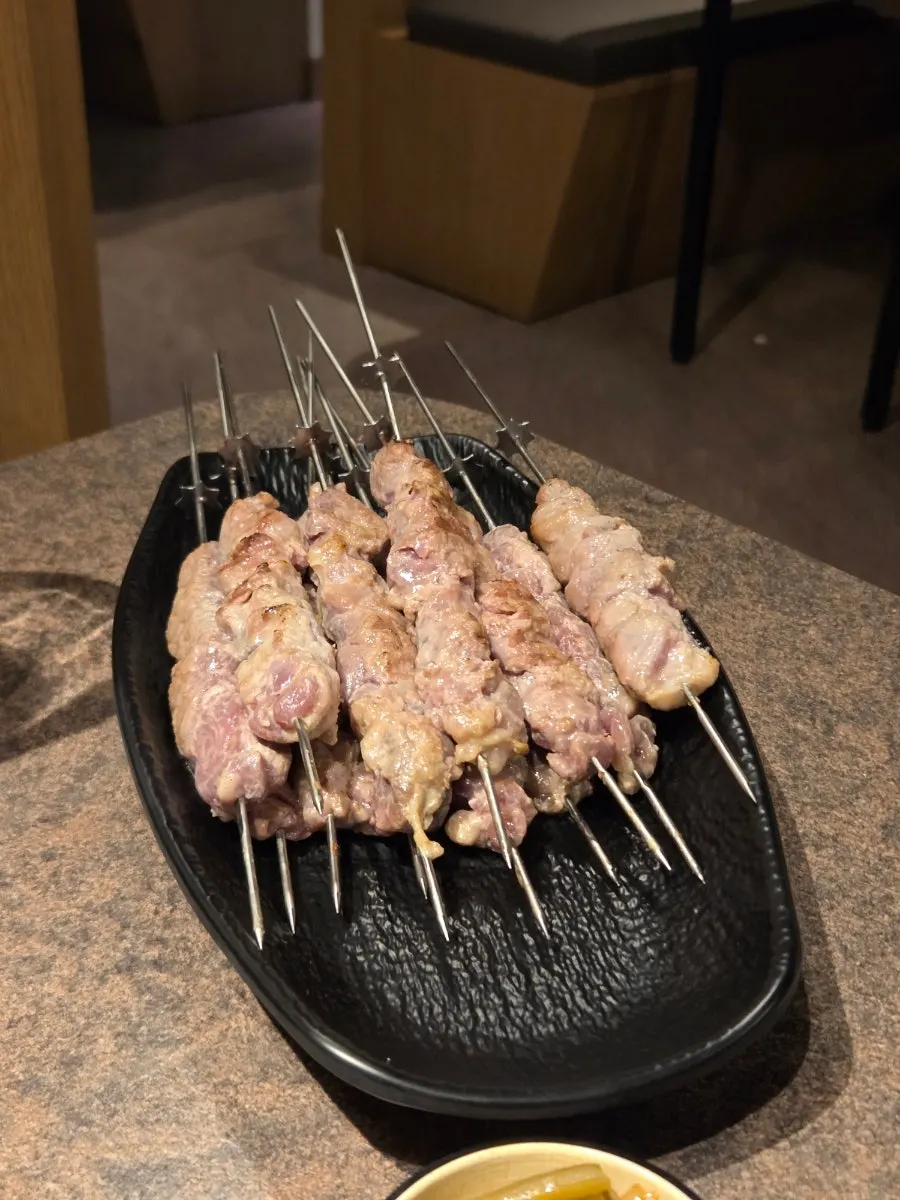 Par-grilled thick lamb skewers