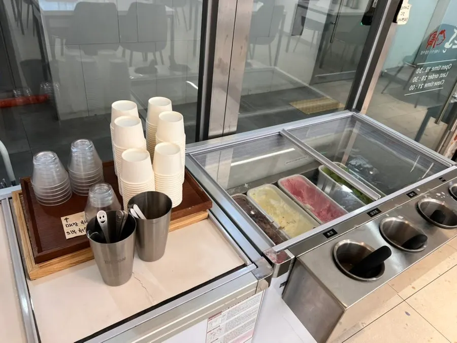 Morning rolls and soup served with pork cutlet