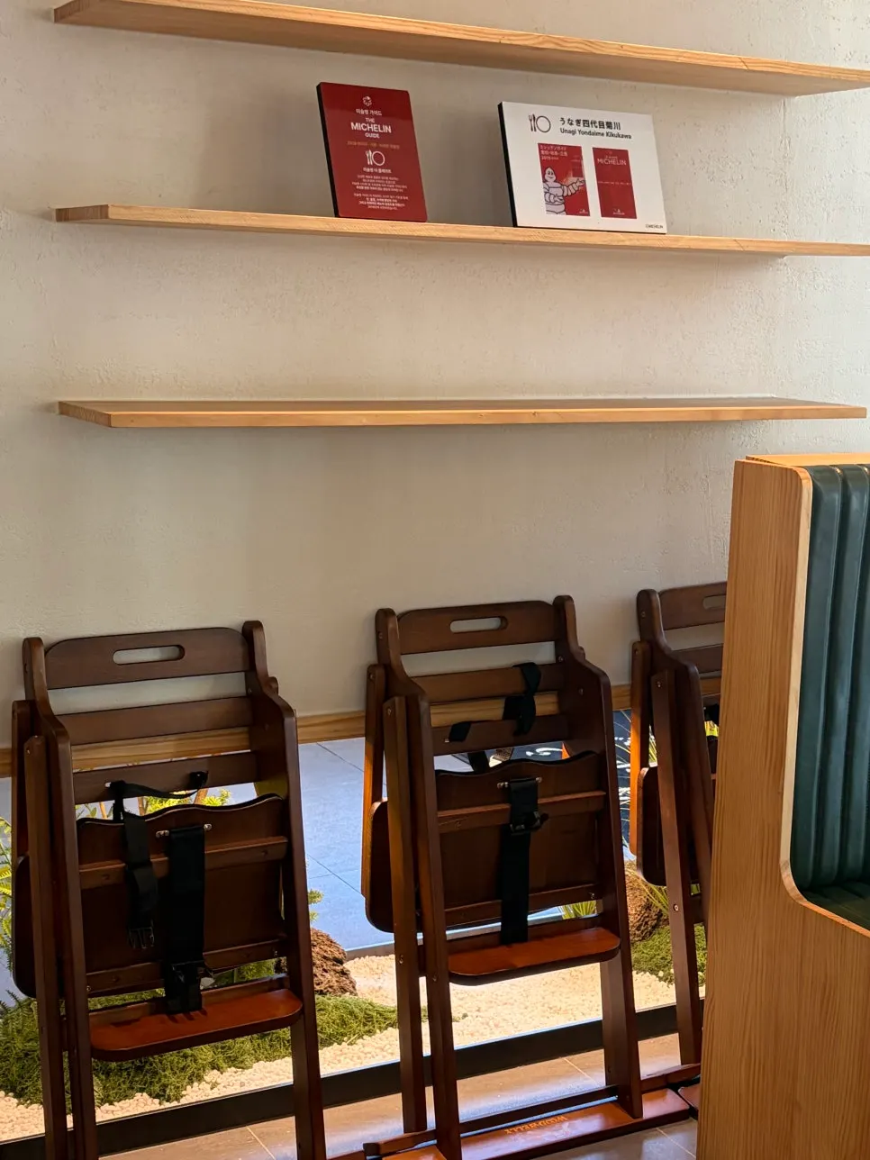 Counter-style seats in front of the kitchen