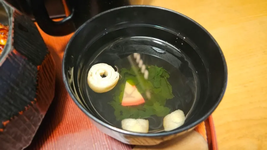 Sides served with eel rice bowl
