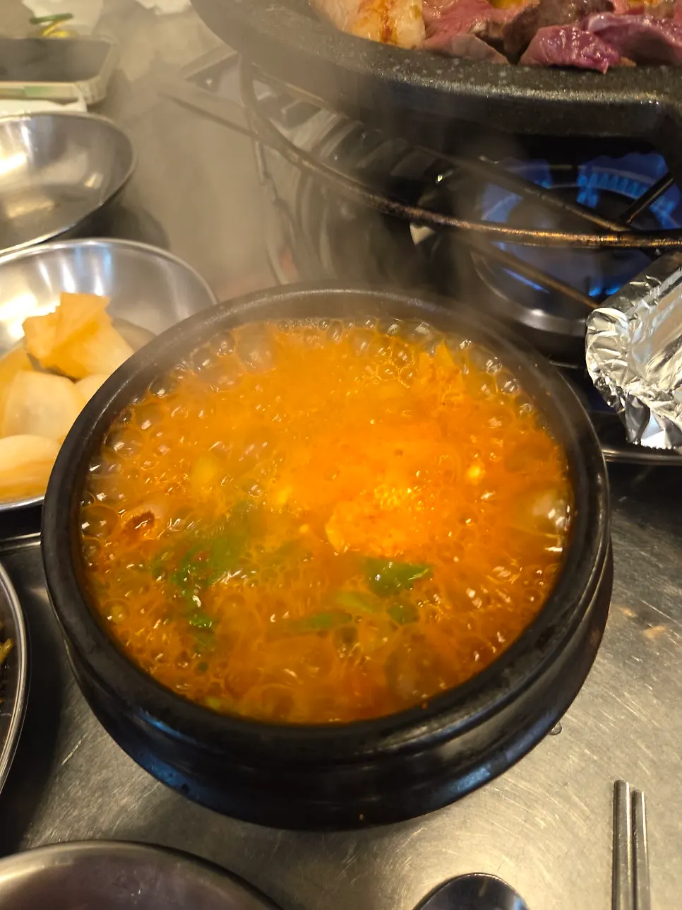 Steaming gopchang hot-pot broth