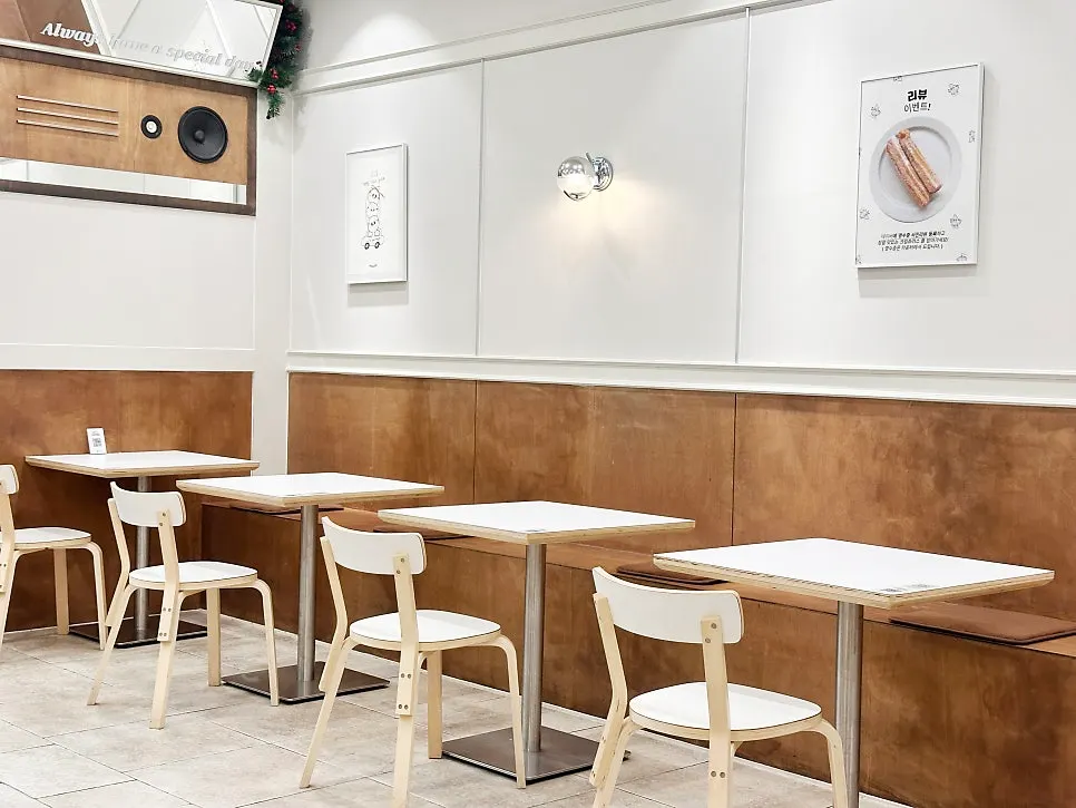 Restaurant interior with 2-person tables and group tables