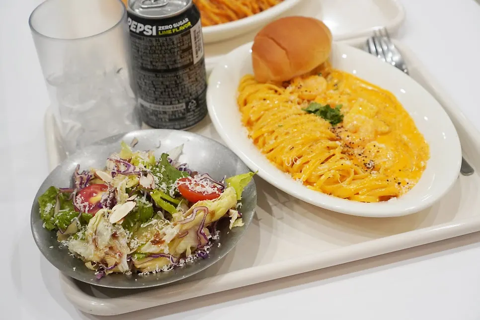 Green salad with Oriental-style dressing and cheese