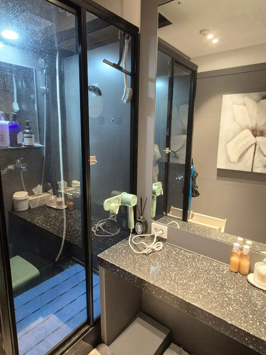 Private single shower inside the changing room