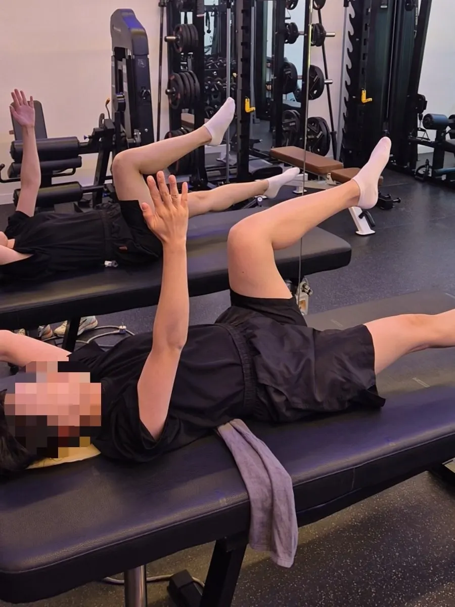 Dead bug core exercise using a towel