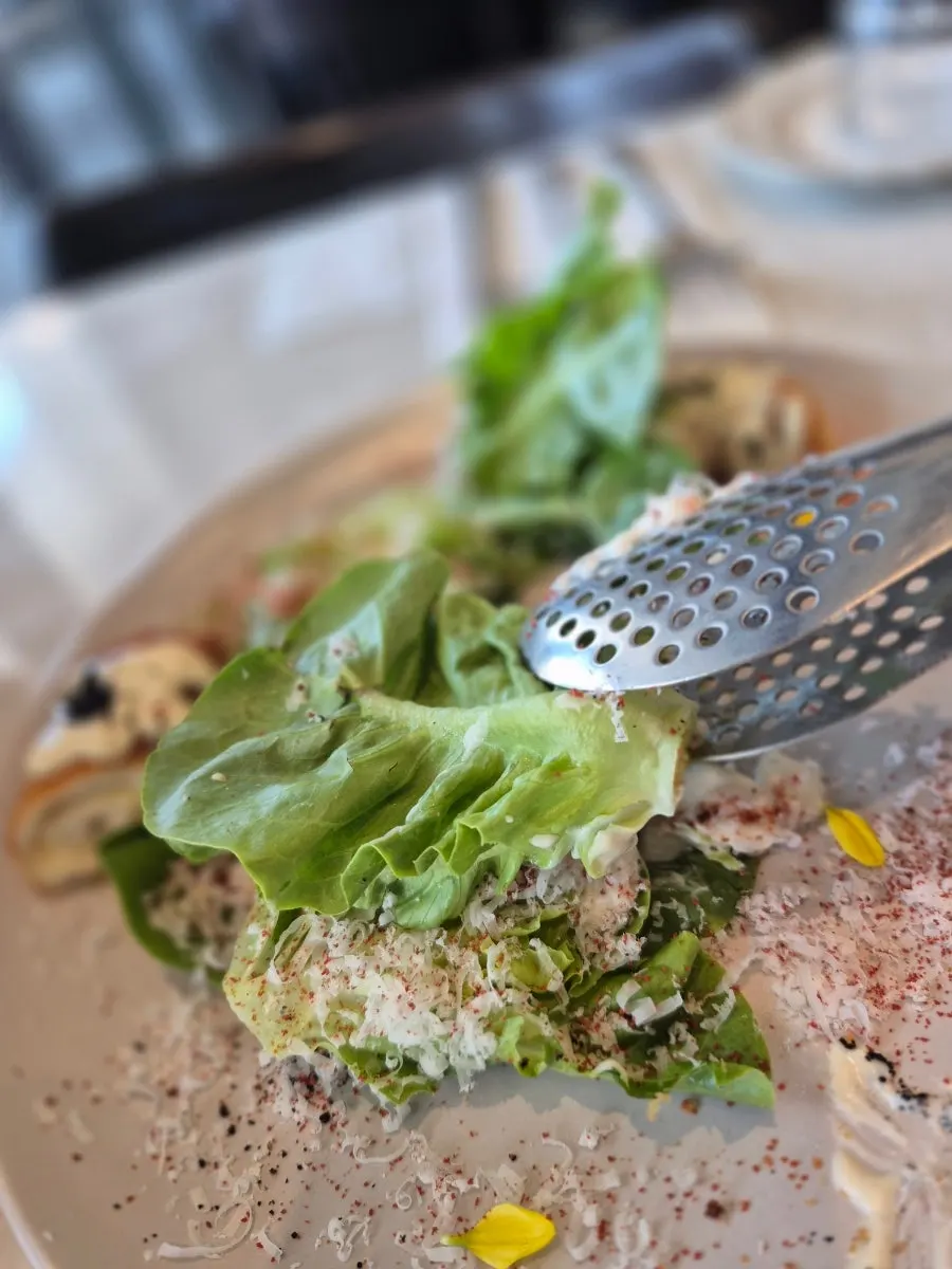 Serving up a portion of the salad