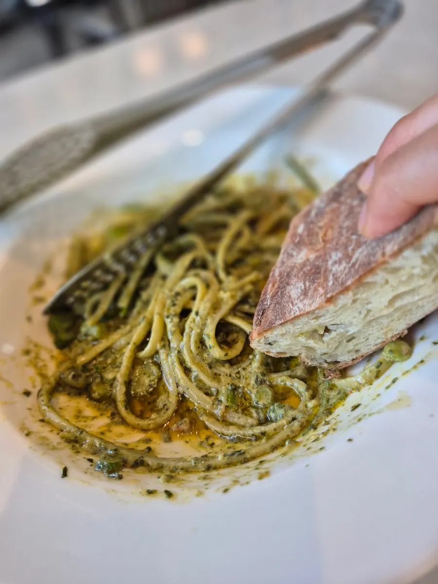 Dipping leftover bread into the remaining gewu sauce