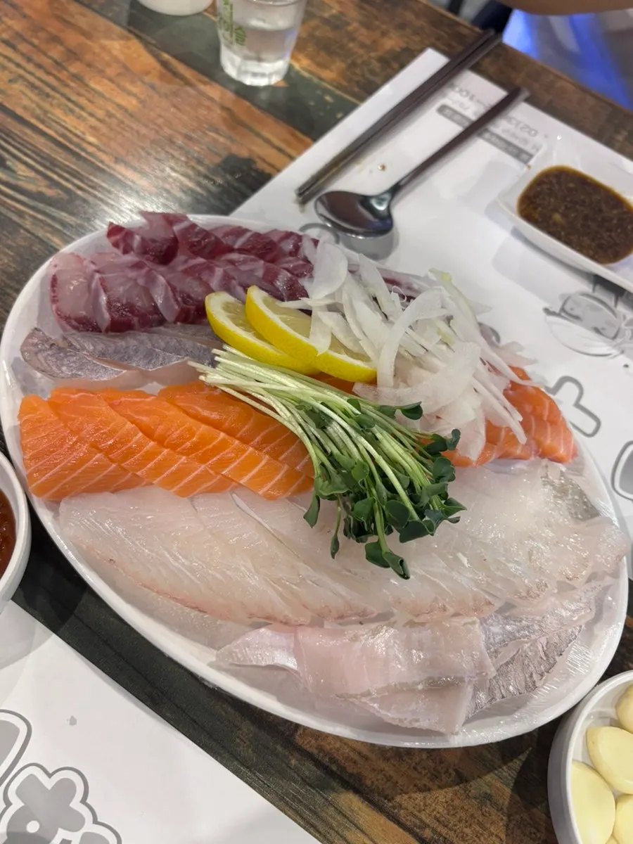 Assorted flounder, rockfish, salmon, and spotted seabass sashimi