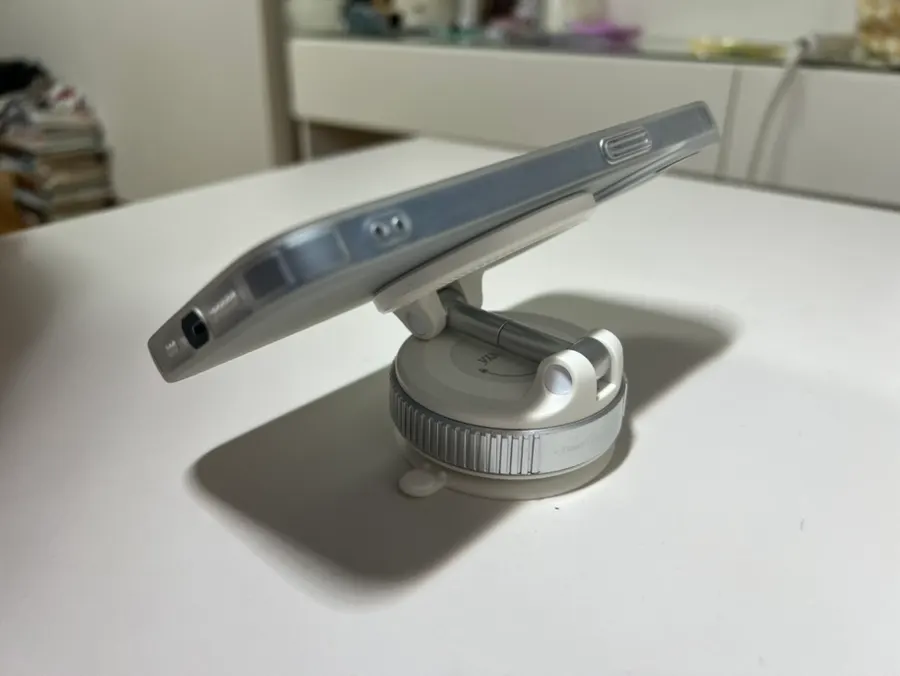 Phone mount attached to a flat wall