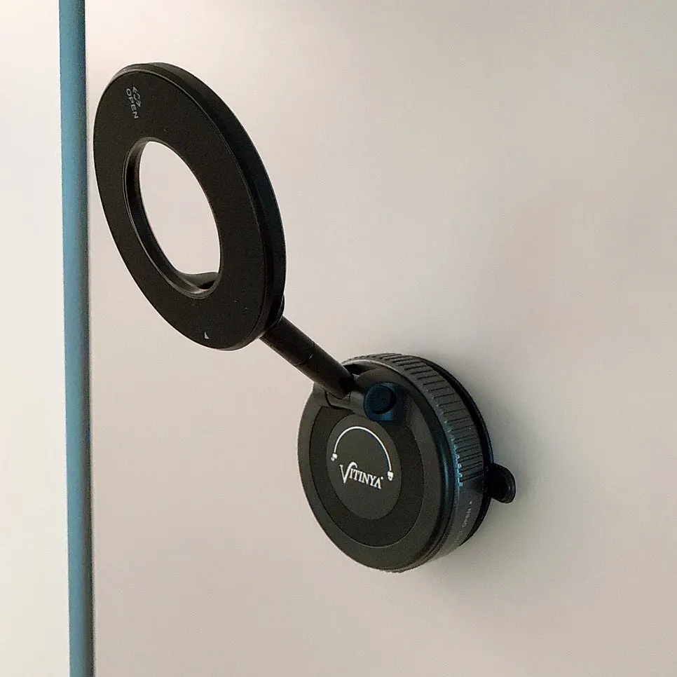 Wall-mounted MagSafe mount used in the kitchen